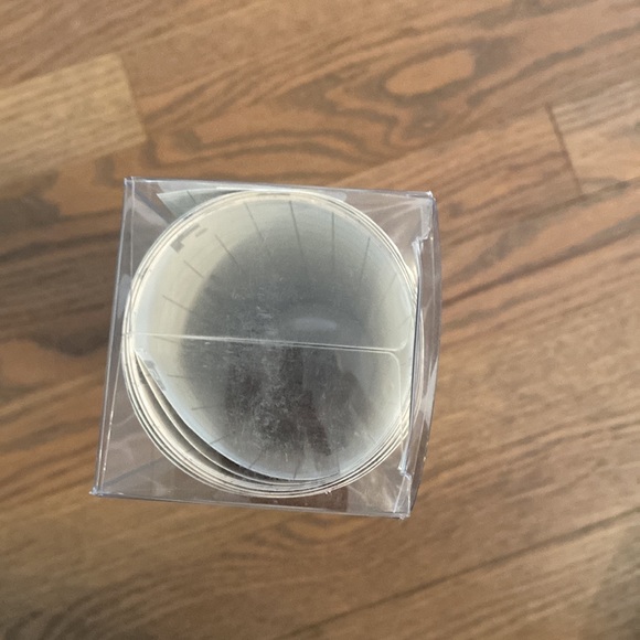 Brand new, unopened, easy stick and peel gold wallpaper dots. - Picture 2 of 2